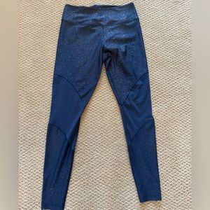 Nike navy shimmery size small leggings with mesh panel